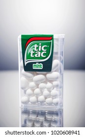 KWIDZYN, POLAND – FEBRUARY 3, 2018: Tic tac drops isolated on gradient background. Tic tacs are manufactured by Italian confectioner Ferrero and were first produced in 1968.