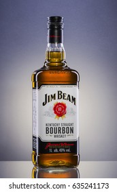 KWIDZYN, POLAND – MAY 4, 2017: Jim Beam bourbon whiskey on gradient background. Jim Beam is owned by Beam Global Spirits and wine and it has been destiled in Clermont, Kentucky USA since 1795