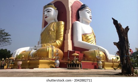 Kyaik Pun Pagoda with four sitting Buddha images in Bago, Myanmar.