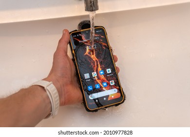 Kyiv (Kiev), Ukraine - July 12, 2021: A Big Rugged Waterproof And Dustproof Protected Smartphone Under Water