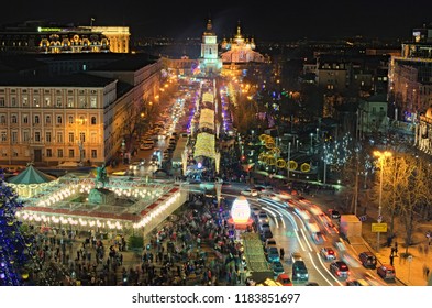 KYIV (KIEV), Ukraine-JANUARY 08, 2018: Main Kyiv's New Year tree and Christmas market on St. Sophia Square. Open air cafes, children's attractions and souvenir kiosks.