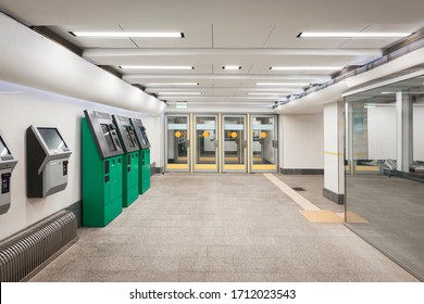 Kyiv, Ukraine - 02 January, 2020: Entrance To The Subway (metro) Station In Kyiv. Train Ticket Vending Machines. Empty Vestibule, Glass Doors, Urban Interior.