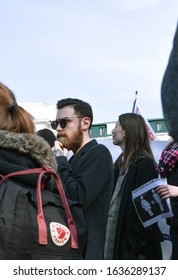 Kyiv, Ukraine, 03/08/2019: Fancy And Stylish Ukrainian Hipster Man Standing In The Crowd At The Women's March 2019 