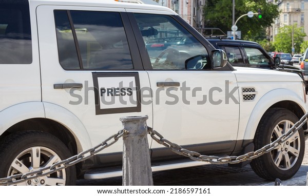 Kyiv,\
Ukraine - 06.14.2022: Mass media auto with sign Press in Kyiv,\
Ukraine. Global journalism. Documentary footage in Ukraine. News\
vehicle on the street. Media symbol on the\
car.
