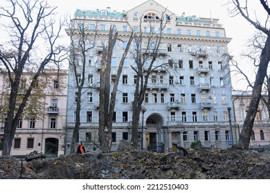 KYIV, UKRAINE - 2022 10 10: The Damaged Facade Of A Building Next To A Sinkhole After A Russian Missile Attack On A Children's Playground In The Center Of The Capital