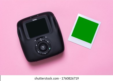 Kyiv, Ukraine - 25 May 2020: Fujifilm Instax Sq 20 Black On A Pink Background With Photo Card Mockup