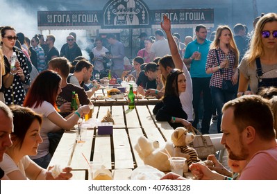 KYIV, UKRAINE - APR 17: Crowd Of Hungry People Eating Meals Around Tables Outdoor During Street Food Festival On April 17, 2016. Kiev Is The 8th Most Populous City In Europe.