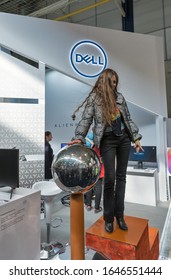 KYIV, UKRAINE - APRIL 06, 2019: Static Electricity In A Girls Hair From A Van De Graaff Generator On Dell, American Multinational Computer Technology Company Booth, CEE 2019 Electronics Trade Show.