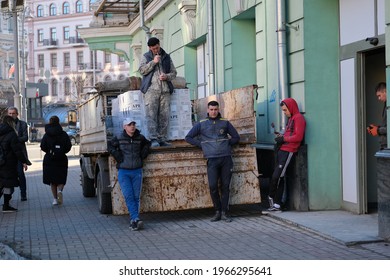 Kyiv, Ukraine - April 10 2021: Workers Standing Near Open Bed Of A Truck