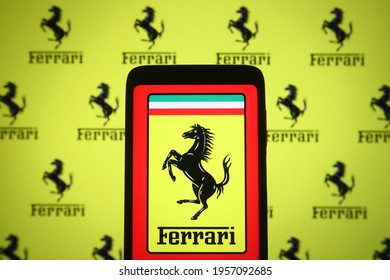 KYIV, UKRAINE - APRIL 16, 2021: In This Photo Illustration Ferrari S.p.A. Logo Is Seen On A Mobile Phone And A Computer Screen.