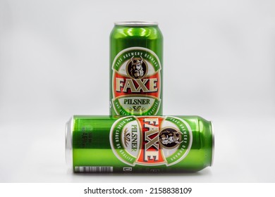 Kyiv, Ukraine - April 24, 2021: Faxe Danish pilsner beer cans closeup against white bacground. Faxe or Fakse is a town on the island of Zealand in eastern Denmark.
