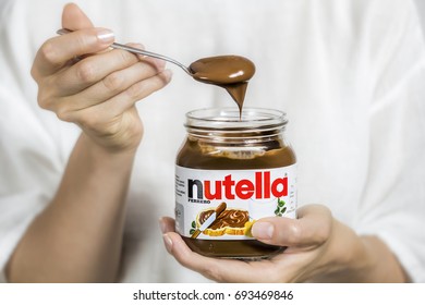 Kyiv, Ukraine - Aug 5th, 2017: Jar Of Nutella. Spoon In Chocolate Cream, Dessert.