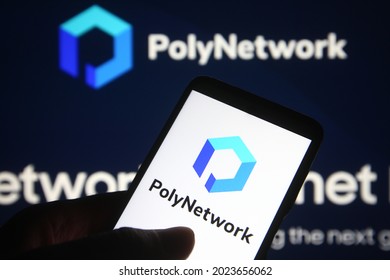 KYIV, UKRAINE - AUGUST 11, 2021: In this photo illustration Poly Network logo is seen on a mobile phone and a computer screen.