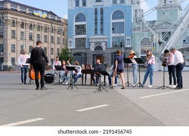 Kyiv, Ukraine - August 17 2022: Small Orchestra Playing Music On Square In Old Town