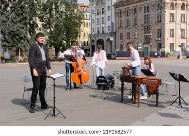 Kyiv, Ukraine - August 17 2022: Small Orchestra Preparing To Play Music On Square In Old Town