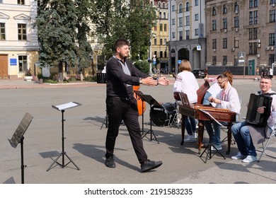 Kyiv, Ukraine - August 17 2022: Small Orchestra Preparing To Play Music On A Square In Old Town