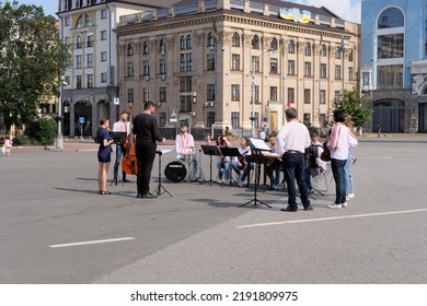 Kyiv, Ukraine - August 17 2022: Small Orchestra Preparing To Play Music On A Square In Old Town