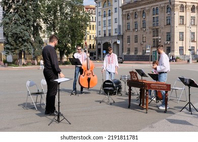 Kyiv, Ukraine - August 17 2022: Small Orchestra Preparing To Play Music On Square In Old Town