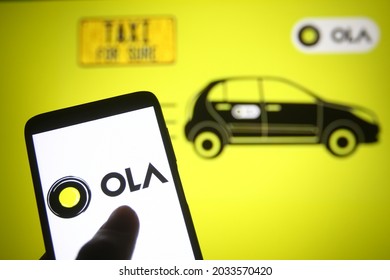 KYIV, UKRAINE - AUGUST 30, 2021: In this photo illustration Ola Cabs logo is seen on a mobile phone screen.