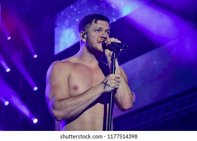 KYIV, UKRAINE - AUGUST 31, 2018: Dan Reynolds Of Imagine Dragons Performs In Concert At Olympic NSC On August 31, 2018, In Kiev