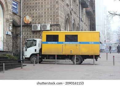 Kyiv, Ukraine - December 12 2021: Yellow Municipal Utility Repair Truck Parked On Street