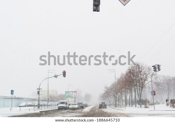 Kyiv, Ukraine, December 23, 2020, a\
crossroads in the city during heavy winter\
snowfall
