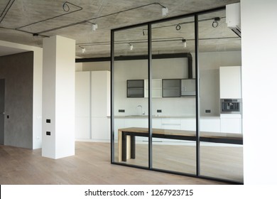 KYIV, UKRAINE - December, 27, 2018: Modern Room After Remodeling And Renovating With Contemporery Glass Wall And Loft Kitchen Interior Design.