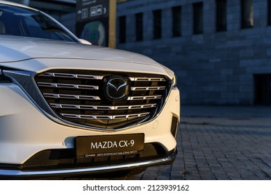 Kyiv, Ukraine - December 4, 2021: Close-up front view of Mazda CX-9 in the city