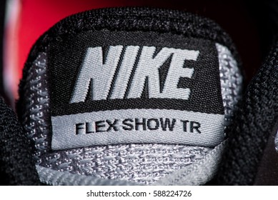 Kyiv, Ukraine - Fabruary 23th, 2017: Nike logo on sneakers. Close-up photo. Nike is a global sports clothes and running shoes retailer.