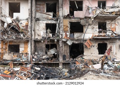 KYIV, UKRAINE - Feb. 25, 2022: War of Russia against Ukraine. A residential building damaged by an enemy aircraft in the Ukrainian capital Kyiv