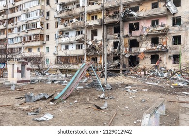 KYIV, UKRAINE - Feb. 25, 2022: War of Russia against Ukraine. A residential building damaged by an enemy aircraft in the Ukrainian capital Kyiv