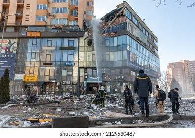 KYIV, UKRAINE - Feb. 25, 2022: War of Russia against Ukraine. View of a civilian building damaged following a Russian rocket attack the city of Kyiv, Ukraine