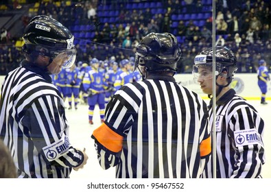 KYIV, UKRAINE - FEBRUARY 09, 2012: Ice-hockey referees in action during Euro Hockey Challenge game between Ukraine and Romania on February 09, 2012 in Kyiv, Ukraine