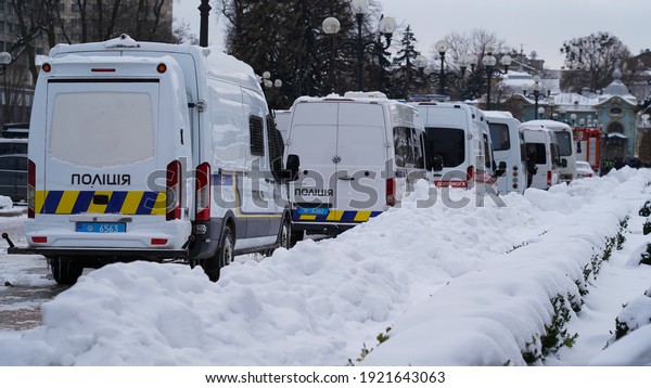 Kyiv, Ukraine - February 19, 2021.\
Police and\
National Guard near the Verkhovna Rada. Protest action of car\
owners with Euro number plates near the Verkhovna Rada. Police and\
National Guard buses