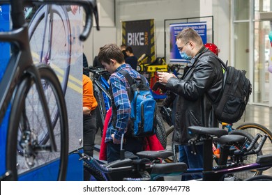 Kyiv, Ukraine, February 28, 2020: A Man With A Mask On His Face To Prevent Coronavirus Disease In The Bike Shop.