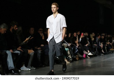Kyiv, Ukraine - February 5, 2020: Model presents a collection of clothes by designer NOVIKOV during the 46th Ukrainian Fashion Week season Fall-Winter 2020-21 at Mystetskyi Arsenal in Kyiv