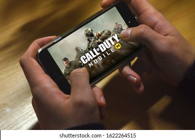 Kyiv, Ukraine; Jan 21, 2020: Hand Holding Phone With Call Of Duty Mobile Logo.