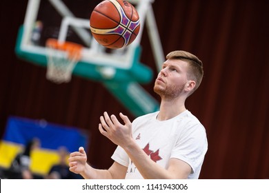 KYIV, UKRAINE - JULY 1, 2018: Davis Bertans from San-Antonio Spurs close-up portait with the ball. FIBA World Cup 2019 European Qualifiers match Ukraine-Latvia