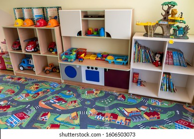 Kyiv, Ukraine - July 17, 2019: Interior of daycare elementary school roomwith schelves full of children bright toys.