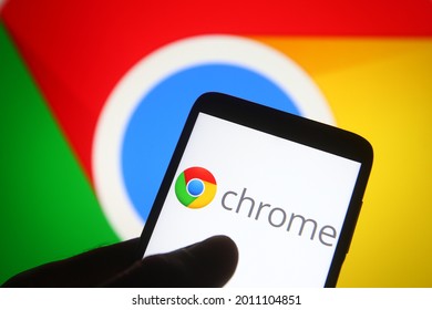 KYIV, UKRAINE - JULY 19, 2021: In This Photo Illustration Google Chrome Web Browser Logo Is Seen On A Mobile Phone In A Hand.