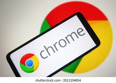 KYIV, UKRAINE - JULY 19, 2021: In This Photo Illustration Google Chrome Web Browser Logo Is Seen On A Mobile Phone And A Computer Screen.