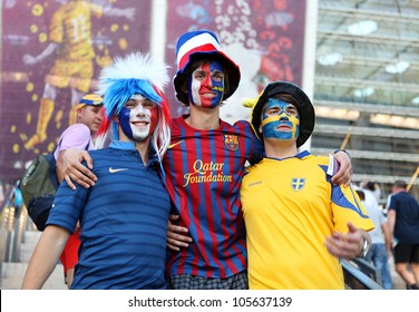 KYIV, UKRAINE - JUNE 19 2012: Football fans on Olympic stadium before start match Sweden- France, Group D.  EURO 2012 in Kyiv, 19 june 2012.