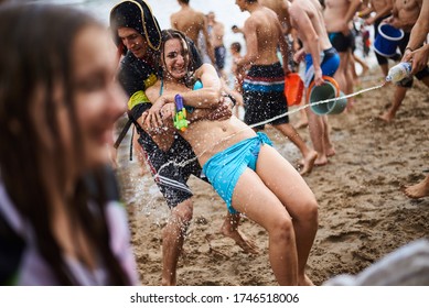 KYIV, UKRAINE - JUNE 19: During The Summer Heat Near Three Hundred Youth People Staged A Water Battle In The Center Of Kyiv On The Venetian Island Near The River Of Dnieper.