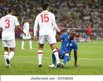 KYIV, UKRAINE - JUNE 24, 2012: Joleon Lescott Of England (L) And Mario Balotelli Of Italy During Their UEFA EURO 2012 Quarter-final Game At Olympic Stadium In Kyiv, Ukraine