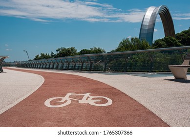 Kyiv, Ukraine - June 24, 2020. Bike Path On Pedestrian-bicycle Bridge Between The Arch Of Friendship Of Peoples And The Park Vladimirskaya Gorka. No People