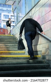 Kyiv, Ukraine - June 6 2022: Man Climbing Steps Of A Stairs Of Underground Passage