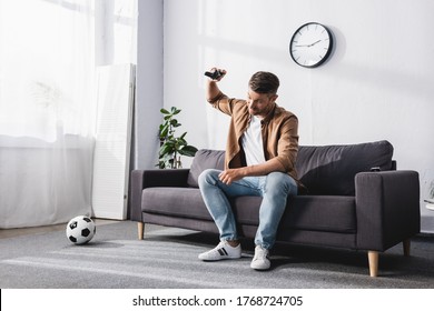 KYIV, UKRAINE - JUNE 9, 2020: Angry Man Throwing Joystick While Losing Video Game