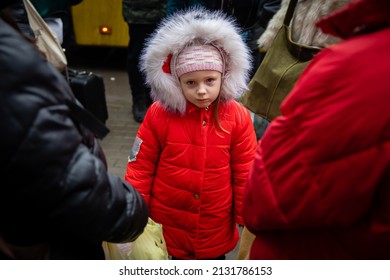 KYIV, UKRAINE - Mar. 03, 2022: War of Russia against Ukraine. Civilians evacuated from Irpen town was transferd to Kyiv by Kyiv territorial defense battalion. War refugees in Ukraine