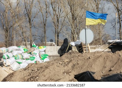 KYIV, UKRAINE - Mar. 08, 2022: War in Ukraine. Territorial defense on one of checkpoints in Kyiv region. Russian forces have invaded Ukraine on 24th February.