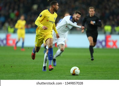 KYIV, UKRAINE - MARCH 14, 2019: Amazing Spectacular Beautiful Run With Terrific Dribbling By  Ruben Loftus­-Cheek Pressured By Tamas Kadar. Europa League. Dynamo Kyiv - Chelsea